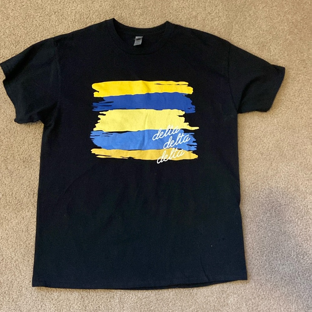 Delta delta delta sorority shirt
Size: L